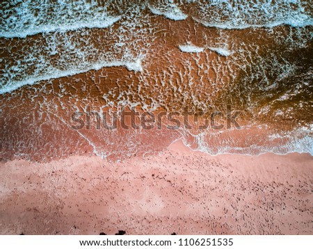 Similar – Aerial View From Flying Drone Of People Crowd Relaxing On Algarve Beach In Portugal