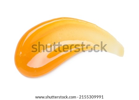 Clear orange gel smear curve with bubbles isolated on white background top view
