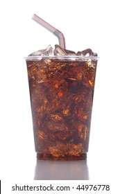 Clear Plastic Cup With Soda Ice And Straw Isolated On White With Reflection Vertical Format