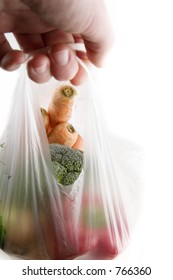 A Clear Plastic Grocery Bag Filled With Vegetables, A Healthy Choice