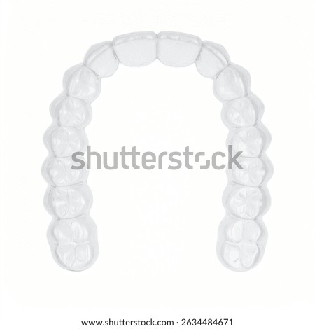 Clear plastic Invisalign retainer for teeth straightening. Isolated on white.