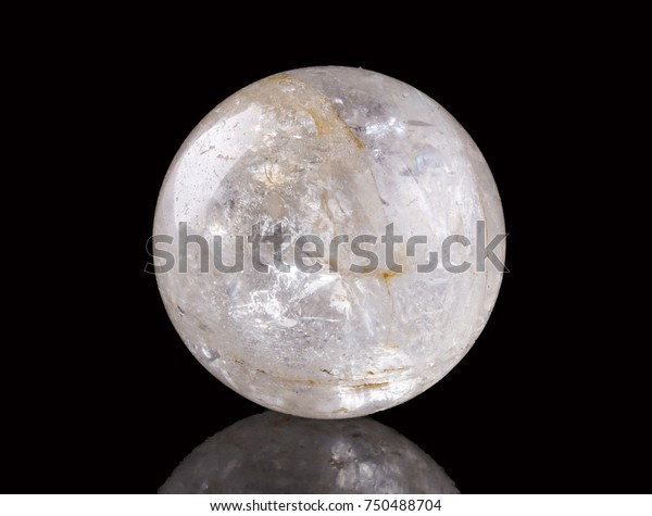 Clear quartz sphere on\
black