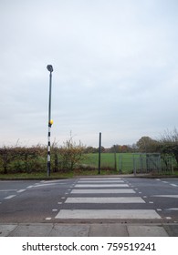 Clear Road Zebra Crossing Road Outside Pole Street Lamp; Essex; England; Uk