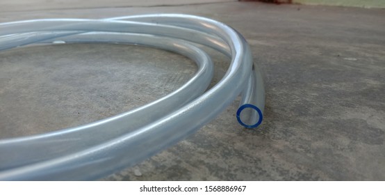 Clear Rubber Hose On The Floor , Closeup