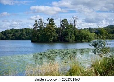 A Clear Sky, A Little Island (crannog) In A Scottish Loch