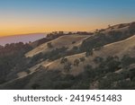 Clear Sky Sunset of California Rolling Hills. Joseph D. Grant County Park, Santa Clara County, California, USA.