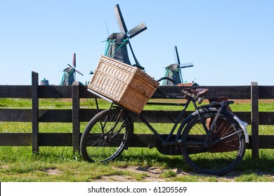 Clear And Traditional Landmark For Holland: Bicycle And Mills