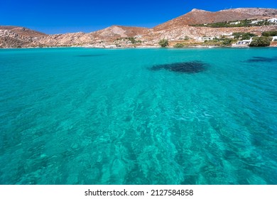 Clear transparent turquoise waters in Kolybithres, bay of Naousa, Paros island, Cyclades, Greece