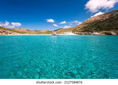 Clear transparent waters in Livadi sandy beach, Despotiko island, Antiparos, Cyclades, Greece