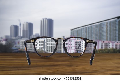 Clear Vision Concept With Eyeglasses And City View