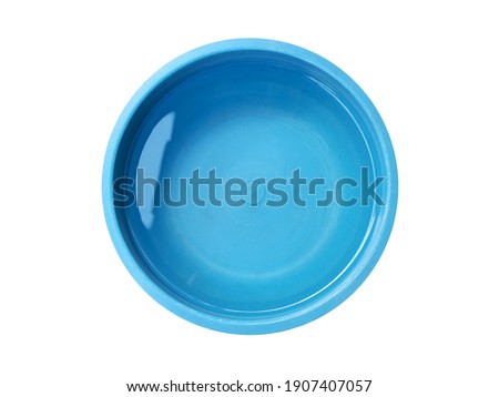 clear water and reflection in blue plastic basin isolated on white background, single round baby bath tub, close up top view