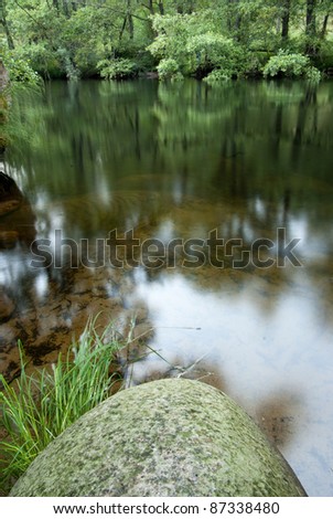 Similar – Stone jetty by the lake