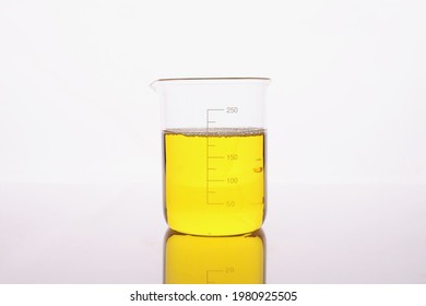 Clear Yellow Liquid Is Poured Into Beaker