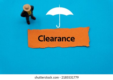 Clearance.The Word Is Written On A Slip Of Colored Paper. Insurance Terms, Health Care Words, Life Insurance Terminology. Business Buzzwords.