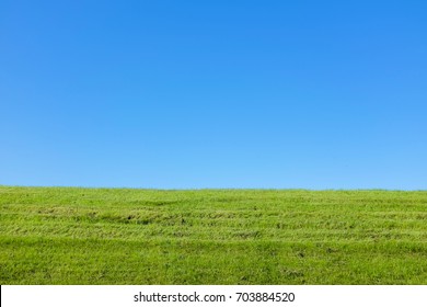 Cleared Scene Of Blue Sky And Green Grass Field No Cloud No People Just Nature