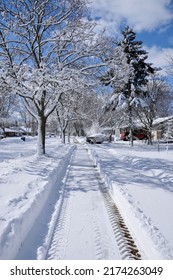 A Cleared Sidewalk After The Large Snowstorm