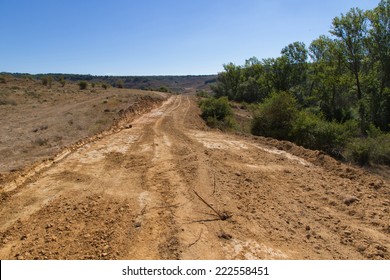 Clearing, Grading, Leveling And Clearing Of Vegetation On Land Field For The Construction Of Road Or Highway