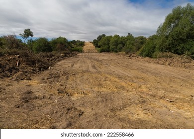 Clearing, Grading, Leveling And Clearing Of Vegetation On Land Field For The Construction Of Road Or Highway 