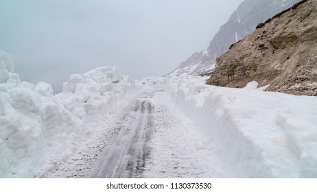 Clearing The Road From Snow In The Mountains. Bad Weather In The Mountains. Blizzard