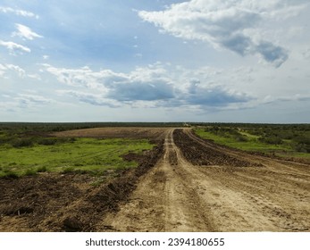 Clearing the Top Soil for Construction of Roads and Turbine Sites on a Texas Wind Farm - Shutterstock ID 2394180655