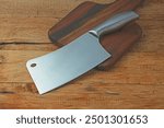 cleaver knife on wooden board