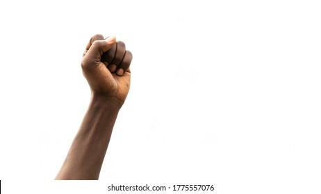 Clenched Fist Up in the Air. Black Person Hand Close Up Shot. Protest for Racial Discrimination. Isolated on White Background with Copy Space Area. - Shutterstock ID 1775557076