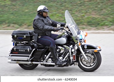 A Cleveland Ohio Motorcycle Police Officer In Action.