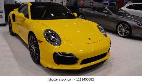 Cleveland, Ohio, Unites States - May 28, 2015: Sports Car Auto Show Of A Bright Yellow Porsche Exhibition 