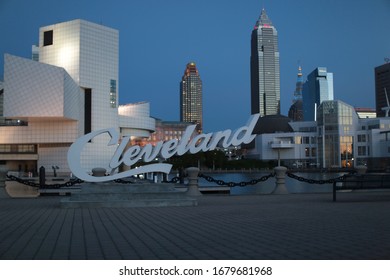 Cleveland, Ohio / USA - Circa May 2017: Rock And Roll Hall Of Fame And Cleveland Downtown Waterfront Sign. 