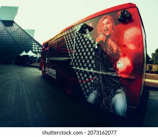 Cleveland, Ohio, USA - July 19, 2021: Rock And Roll Hall Of Fame Entrance And A Bus Parked Besides It. 