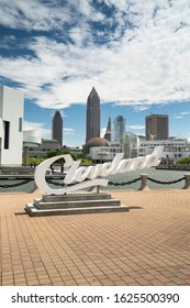 Cleveland, Ohio, USA - June 19, 2018:  The Famous Cleveland Sign Landmark Script Overlooking The Skyline In Downtown Ohio USA