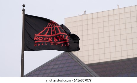 Cleveland, Ohio/USA - June 1, 2019: Rock And Roll Hall Of Fame Banner And Flag With Building In Background.