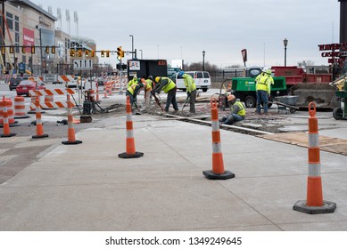 Cleveland, Ohio/USA -  March 15 2019: Large, Loud, And Diverse Construction Crew Work On The Corner Of W Huron Rd And Ontario St Across From The JACK Parking Garage And Tower City Station.