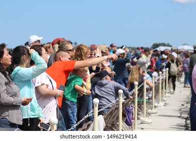 Cleveland, OH-USA August 31, 2019: Cleveland National Air Show. Crowd Of Spectators Enjoying A Display Of Air Tactical Maneuvers.