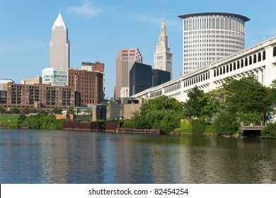 Cleveland From The River Commercial And Residential Buildings In The Downtown Area Of Cleveland, Ohio As Seen From The Bank Of The Cuyahoga River