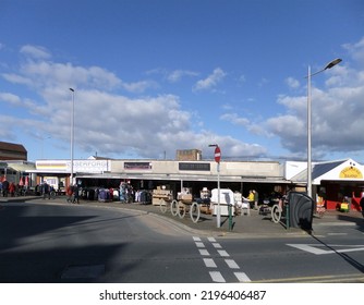 Cleveleys, Blackpool, Lancashire, United Kingdom - 4 March 2022: People Shopping Outside The Treasure Island Amusement Arcade And Shops In Thornton Cleveleys Near Blackpool