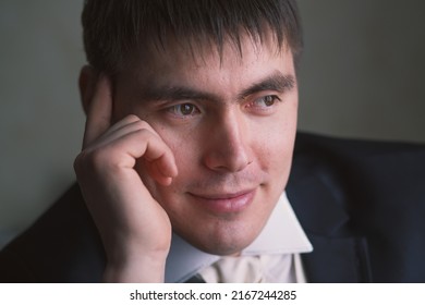 Clever Handsome Man. Serious Strict Arrogant Person Showing No Interest In Communicating With Other People While Standing Alone And Looking Thoughtful