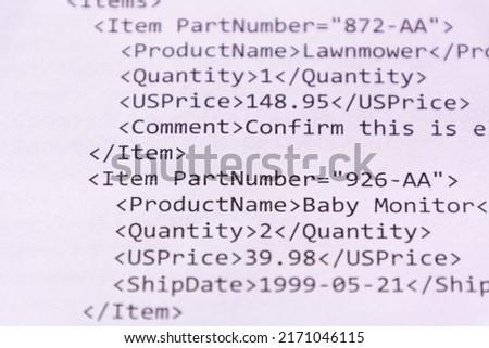 click of xml code printed on white sheet of paper
