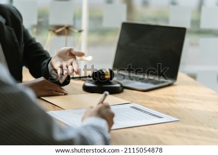 Client is bringing the documents to clarify the law to the lawyer at the prosecutor office.