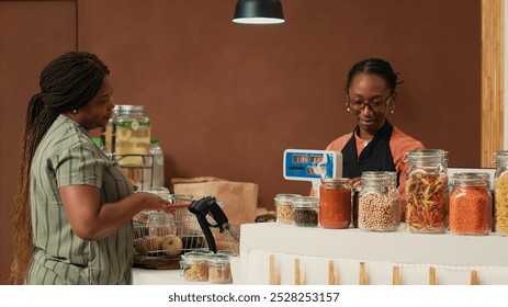 Client bringing organic produce selection at checkout, talking to merchant about sustainable lifestyle and healthy eating. Woman shopping for ethically sourced goods and natural food supplies. - Powered by Shutterstock