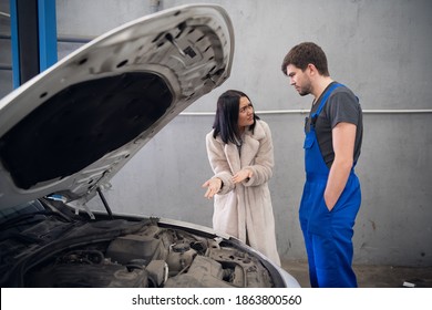 A Client Complains To A Repairer About A Bad Car Repair