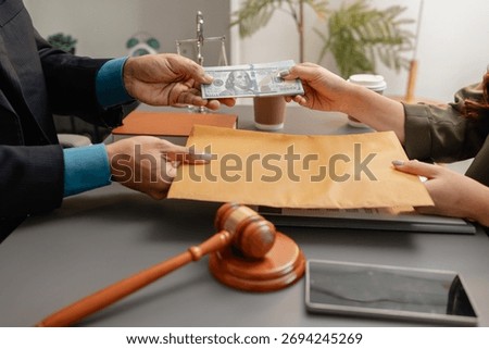 A client hands a stack of cash to a lawyer who holds a brown envelope on the desk, symbolizing bribery, corruption, and unethical financial dealings in a legal or business context.