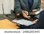 client meets with a lawyer within the legal counsel office to request advice about law and lawsuit that will be filed in order to obtain an advantageous outcome in lawsuit. legal counsel concept 