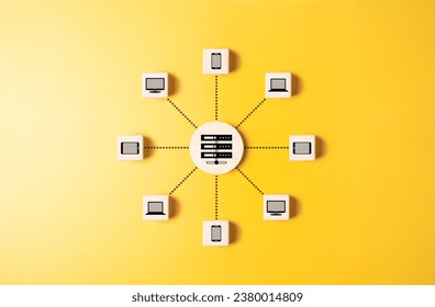 Client server connection or data center concept. Cloud computer technology. Wooden cubes with server and laptop, computer, smartphone, and tablet icons linked with each other with connected line