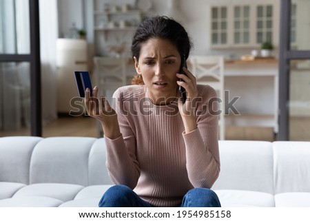 Client support line. Worried young hispanic woman ebank customer contact call center service having problem with payment by credit card. Anxious millennial lady talk to personal bank manager ask help