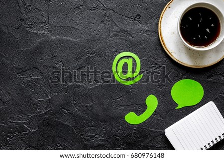 client support service workdesk with mail signs black background top view mockup