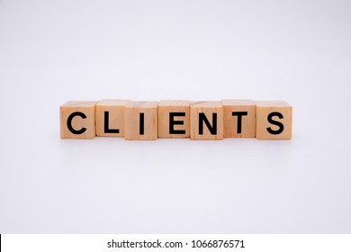 CLIENTS word on wooden cubes - Shutterstock ID 1066876571