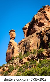 Cliff With Balanced Rock At Colorado National Monument