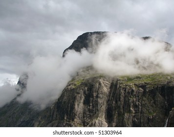 cliff in clouds