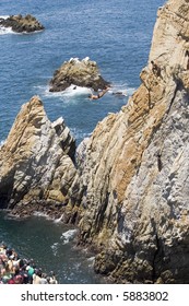 Cliff Diving In Acapulco, Mexico With Diver In Air